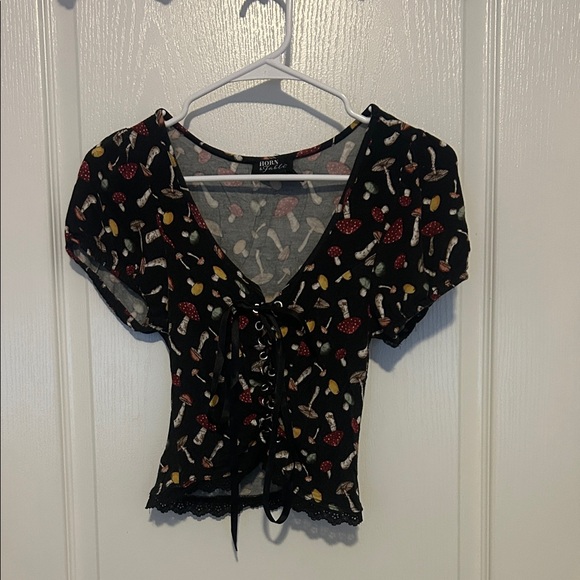 Thorn & Fable Tops - Stylish Black Mushroom Print Lace-Up Blouse